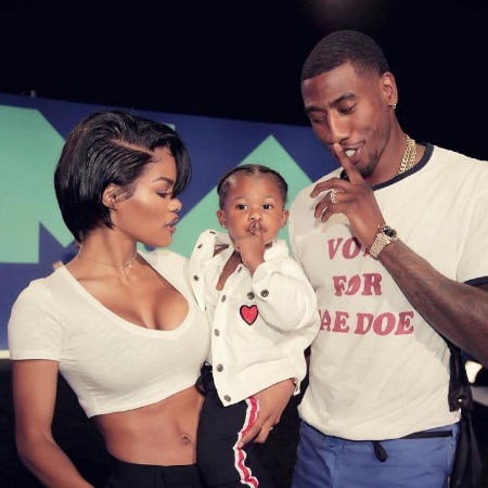 Iman Tayla Shumpert Jr and her father Iman Shumpert doing similar pose.